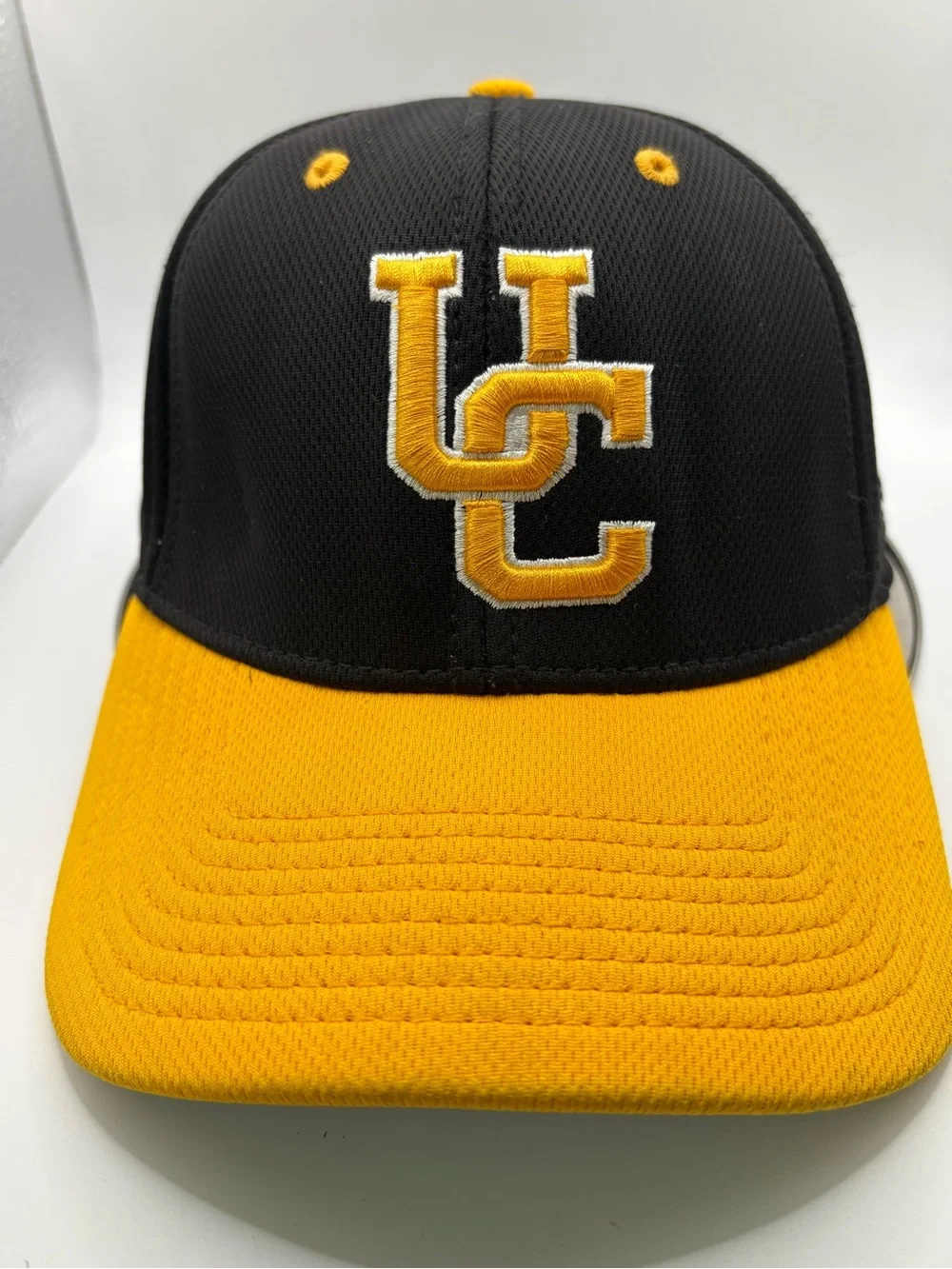 The Game Pro UC Jackets Black Gold Fitted Hat Size L GameTek Performance Cap